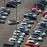 cars parked on parking lot during daytime